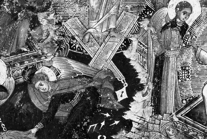 Under his feet: shattered doors, locks, and bolts.