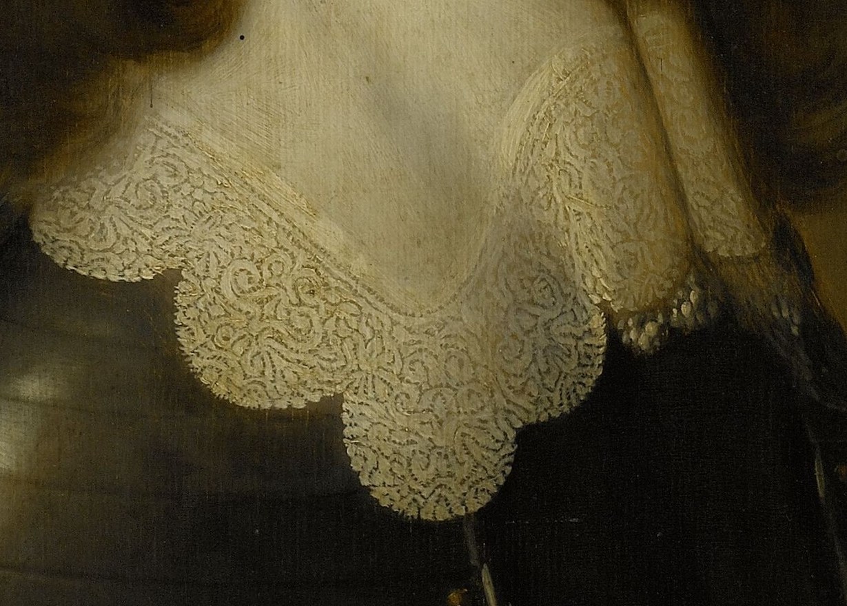 Even the intricate lace collar seems to glow.