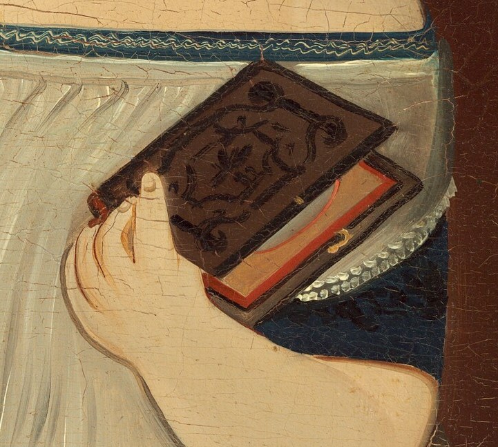 The book in the child's hand suggests learning and contemplation.