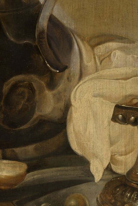 The soft folds and subtle shadows create a sense of texture and volume, contrasting with the harder objects.