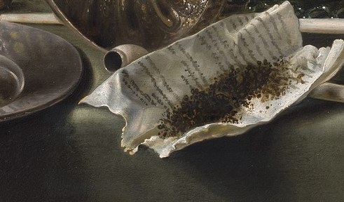Now look closely at the crumpled paper on the right.