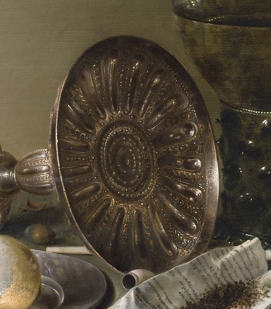 The detailed metalwork suggests wealth and craftsmanship, a focal point of the composition.