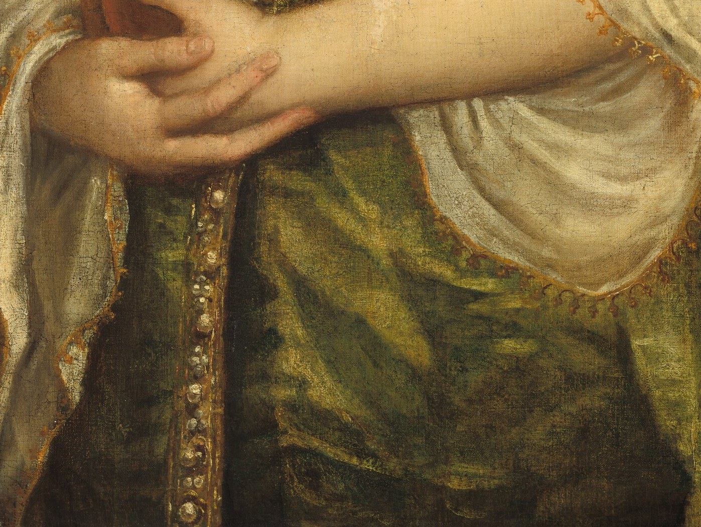 But the whole portrait turns on what she holds.