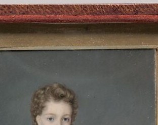 Primary emotional anchor of the portrait; the child's composed but slightly grave expression captures the tension between childhood innocence and the formality demanded by sitting for a miniature.
