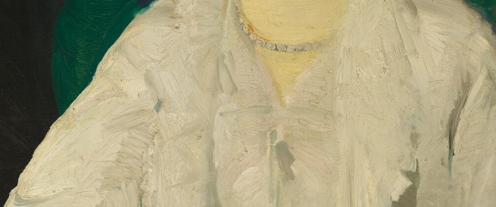 The saturated emerald sash is the single strongest color accent , a deliberate compositional punch against the white dress and muted background.