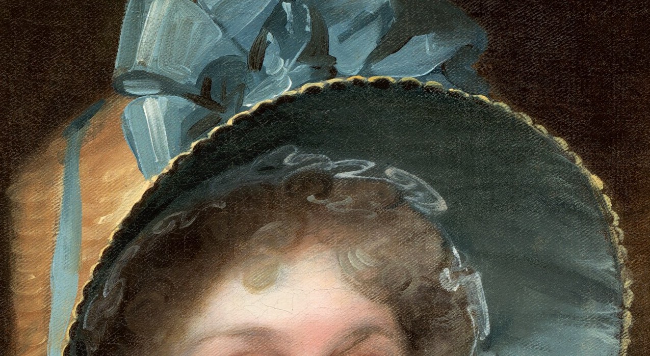 A woman whose whole life had just turned, looking straight at you.