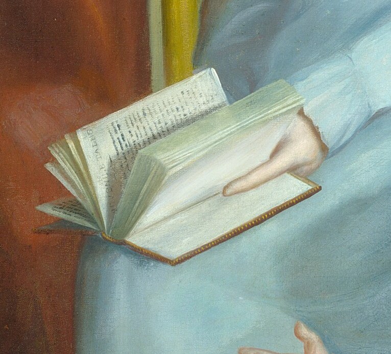 This open book suggests the family valued education and literacy.