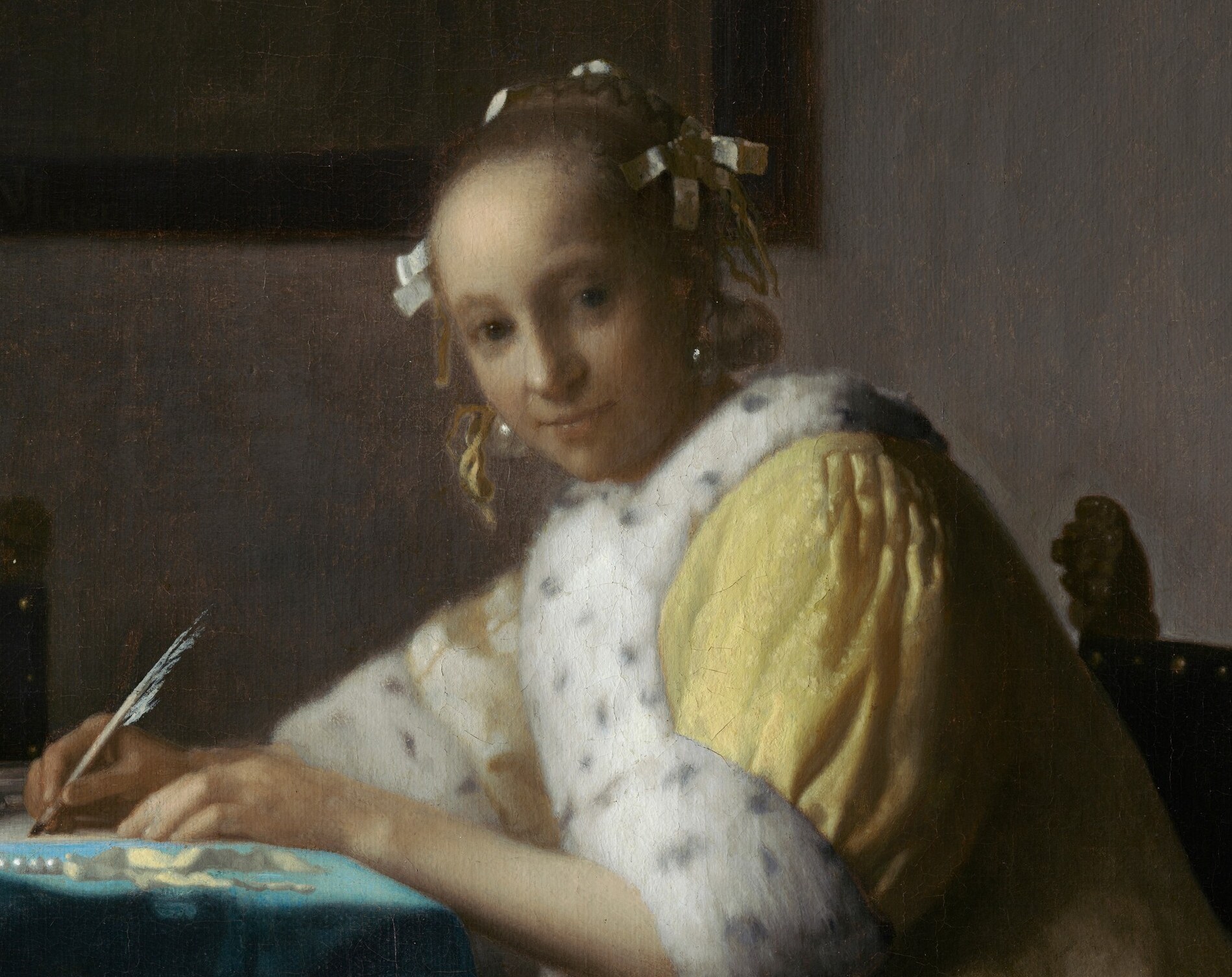 The yellow satin jacket is Vermeer's most expensive pigment.