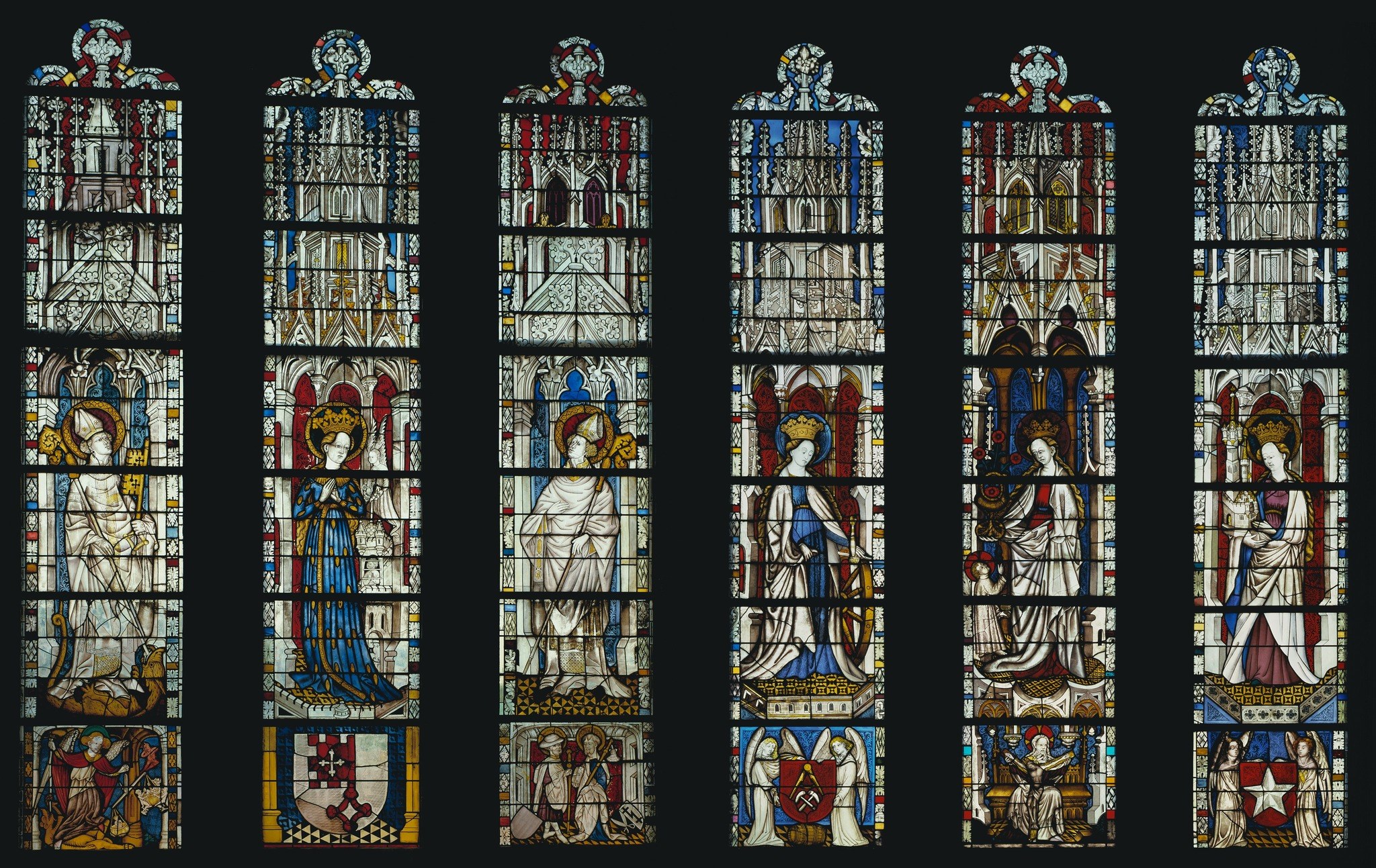 The leading itself is the virtuoso technique , the glazier used the structural necessity of lead to draw contour and fold; a macro shot of any robe would reveal how line and color collaborate in a way impossible in paint.