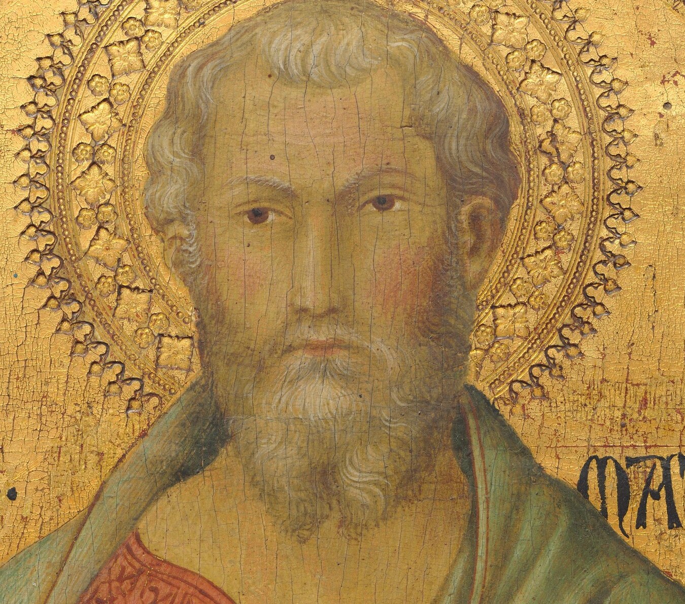 His halo is adorned with intricate stars, a divine detail.