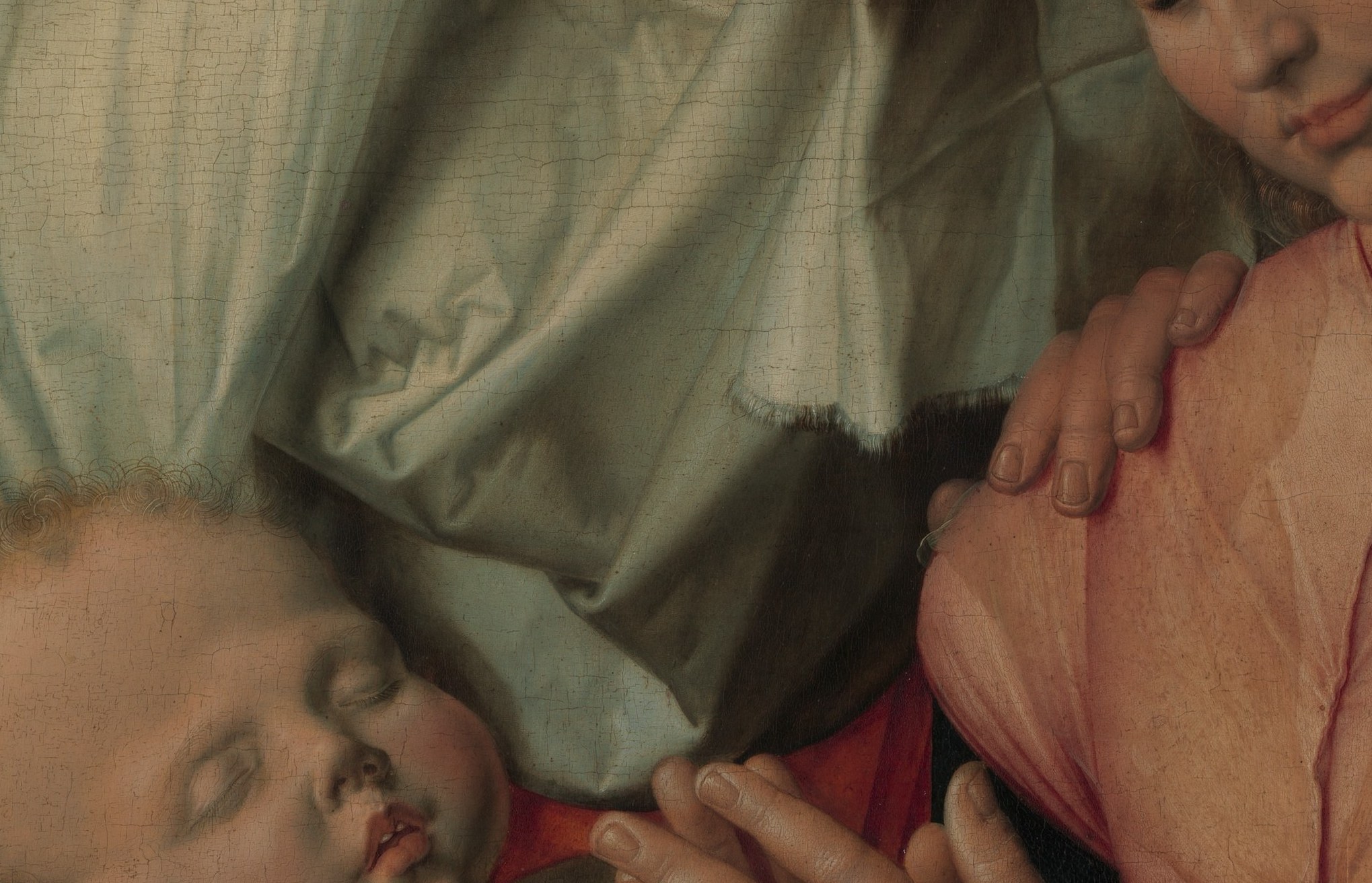 Look at Saint Anne's hands on the child.