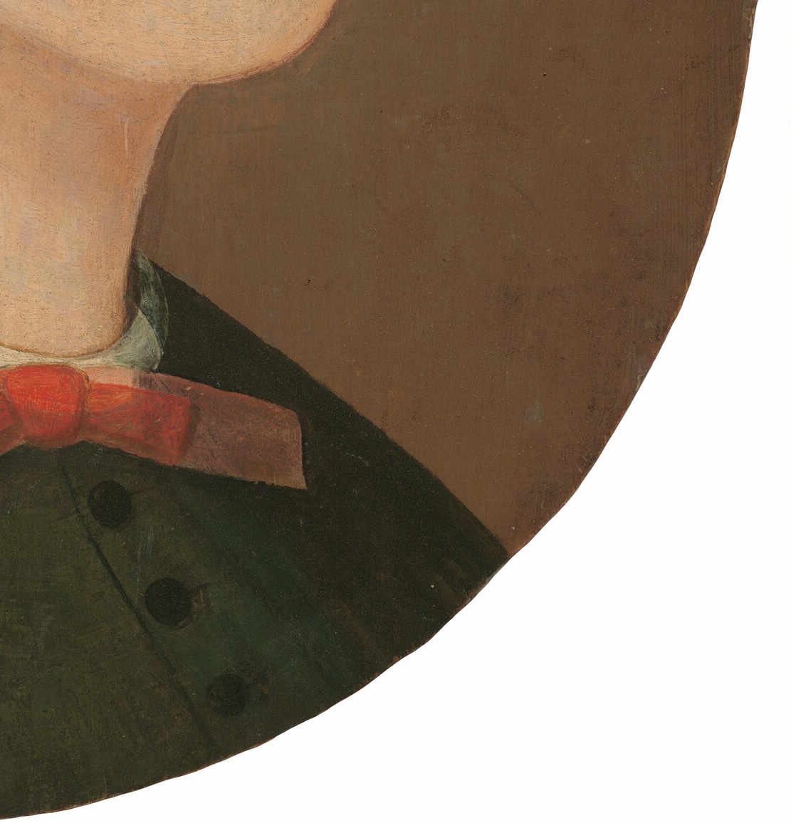 The simple, dark fabric of her dress emphasizes her face and the striking color of her eyes.