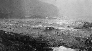 But look closer, two figures stand at the water's edge.