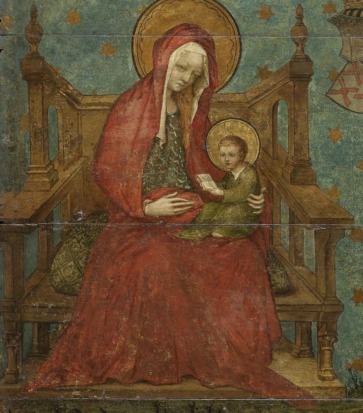 The Virgin Mary watches over them, robed in rich oil paint.