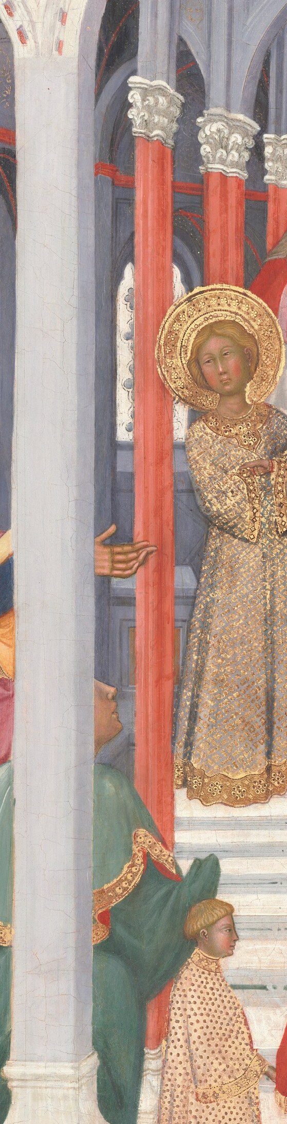 The intricate columns frame the sacred action.