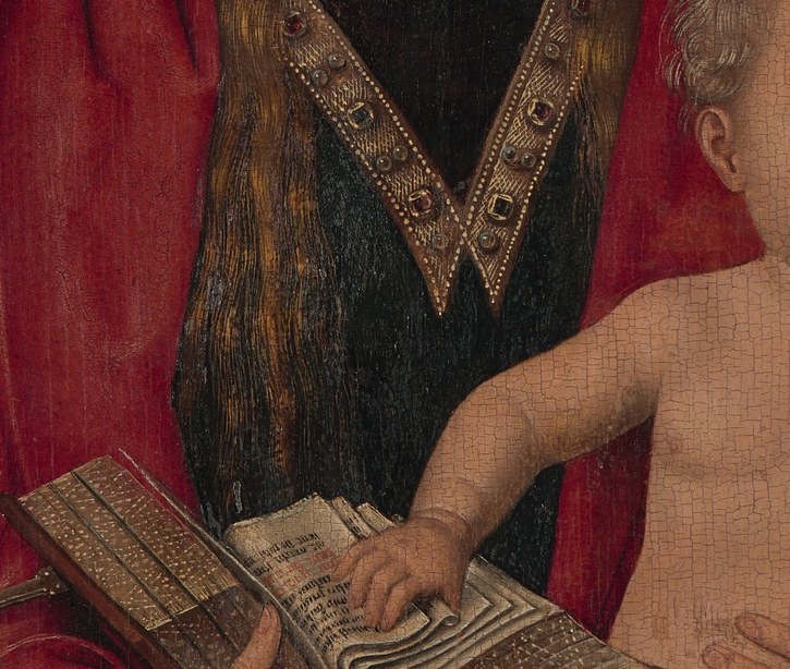 The book in their hands is a Book of Hours, a prayer guide for the laity.