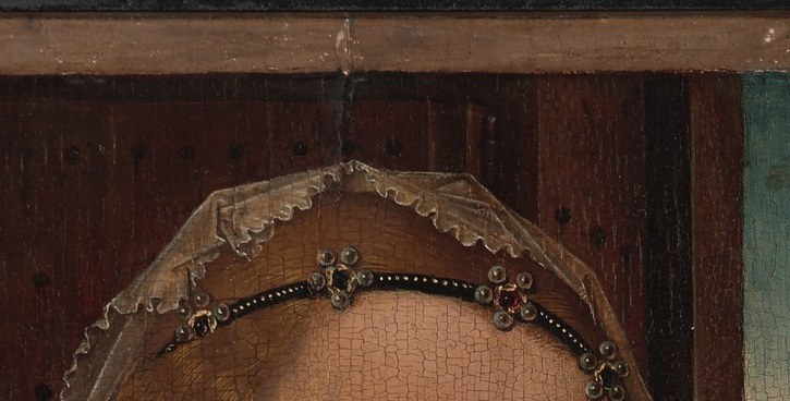 She wears a crown, but she is not the queen of this painting.
