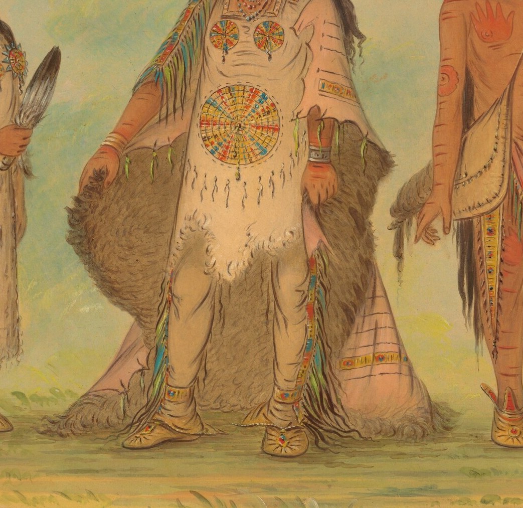 And this incredibly detailed beaded robe.