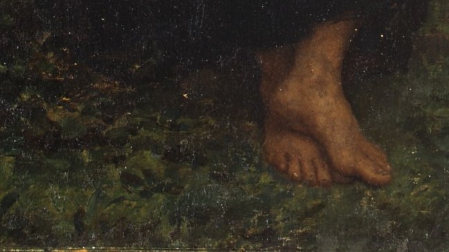 Barefoot, quiet, absorbed in simple work.