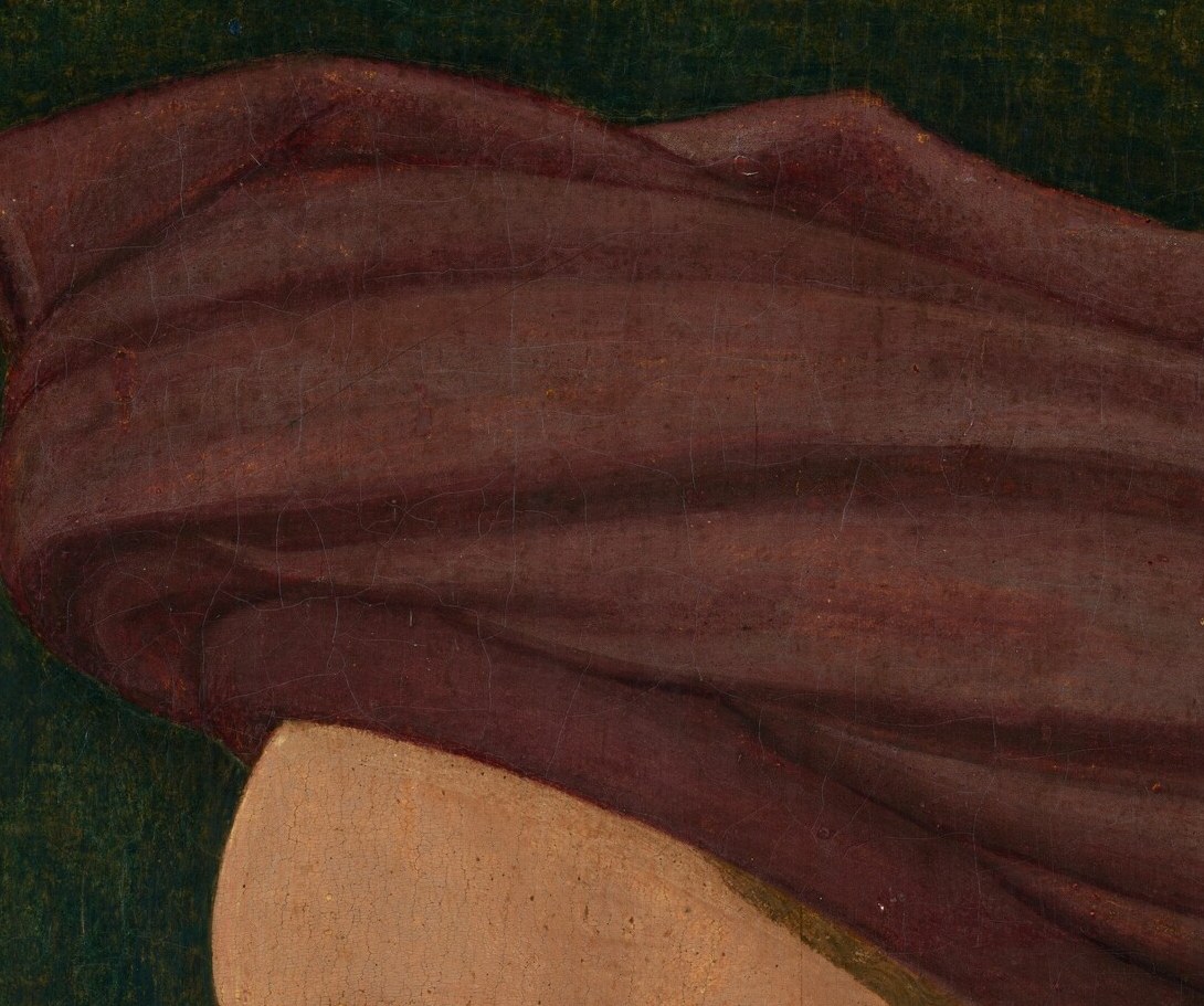 Look closely at his forehead, where the skin catches light.