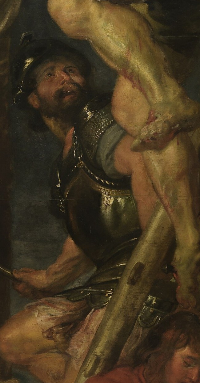 He makes sure Christ is dead. A brutal action.