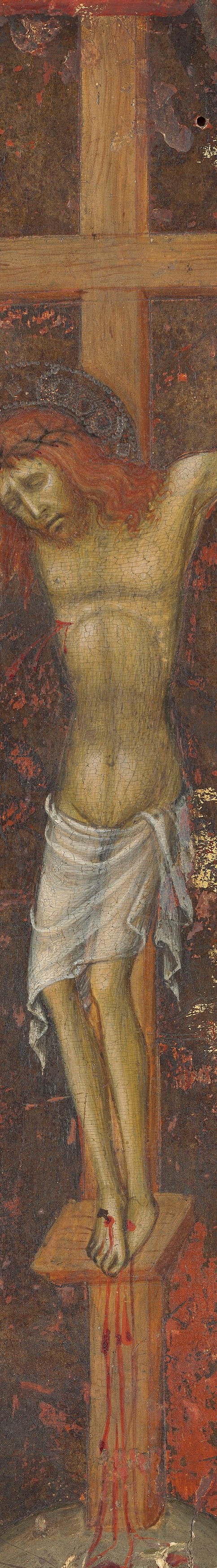 The front showed a Crucifixion hung against a wall.