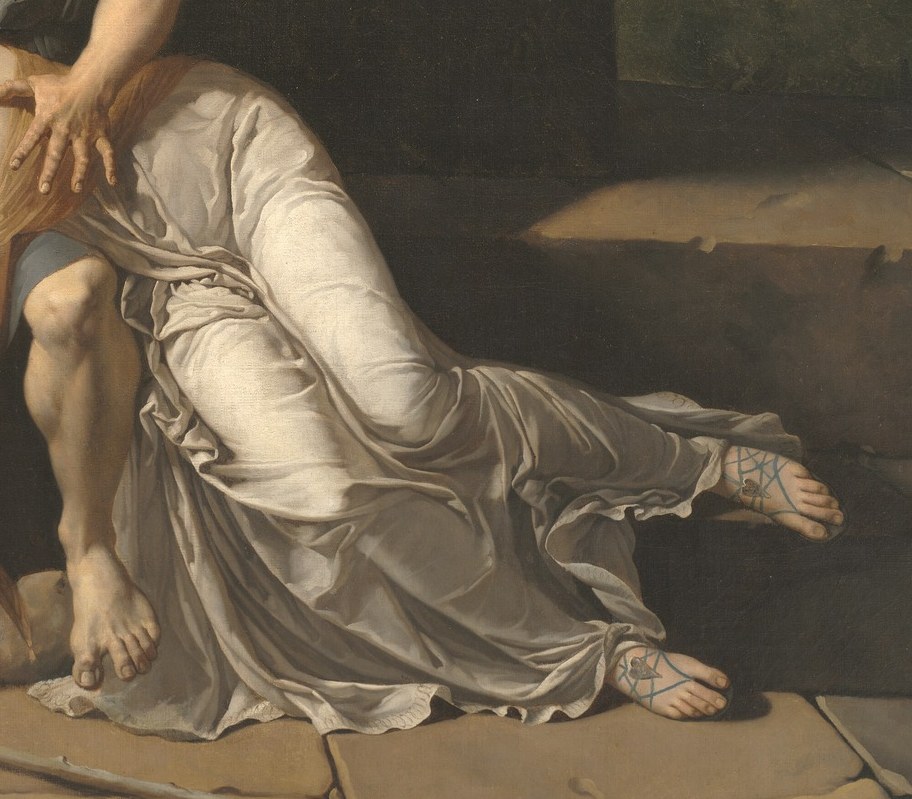 His daughter, Antigone, guides him through the wilderness.