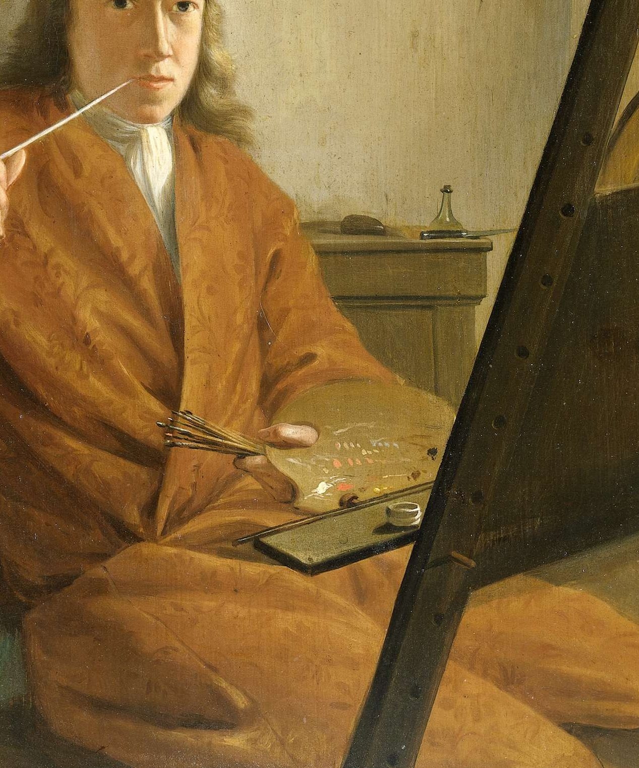 See how light falls across the fabric of his orange coat.