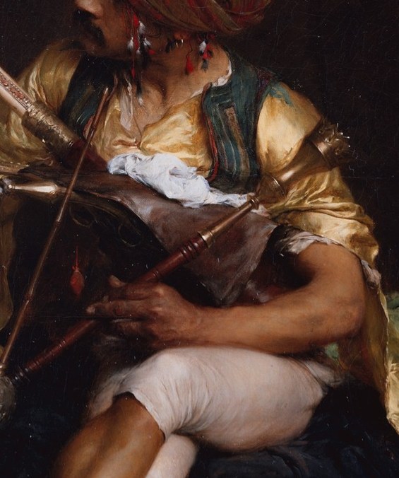 His vibrant turban, robe, and vest suggest an 'exotic' world.