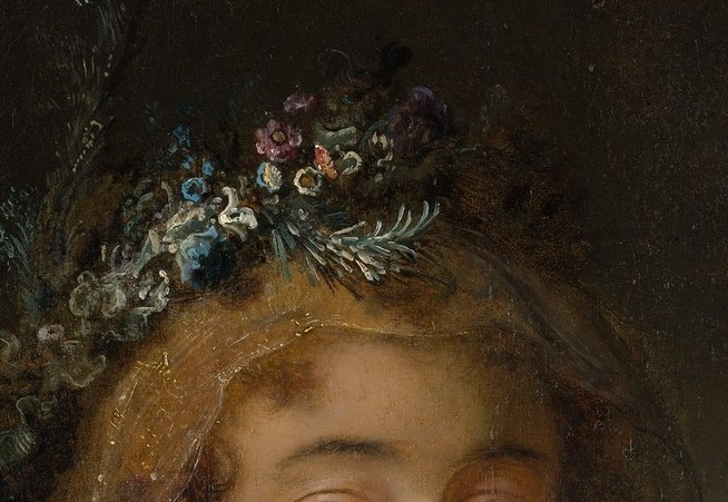 Her gaze, lost in thought, suggests a private world.