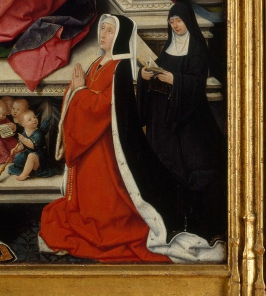 Look at the woman in red, likely the Virgin Mary.