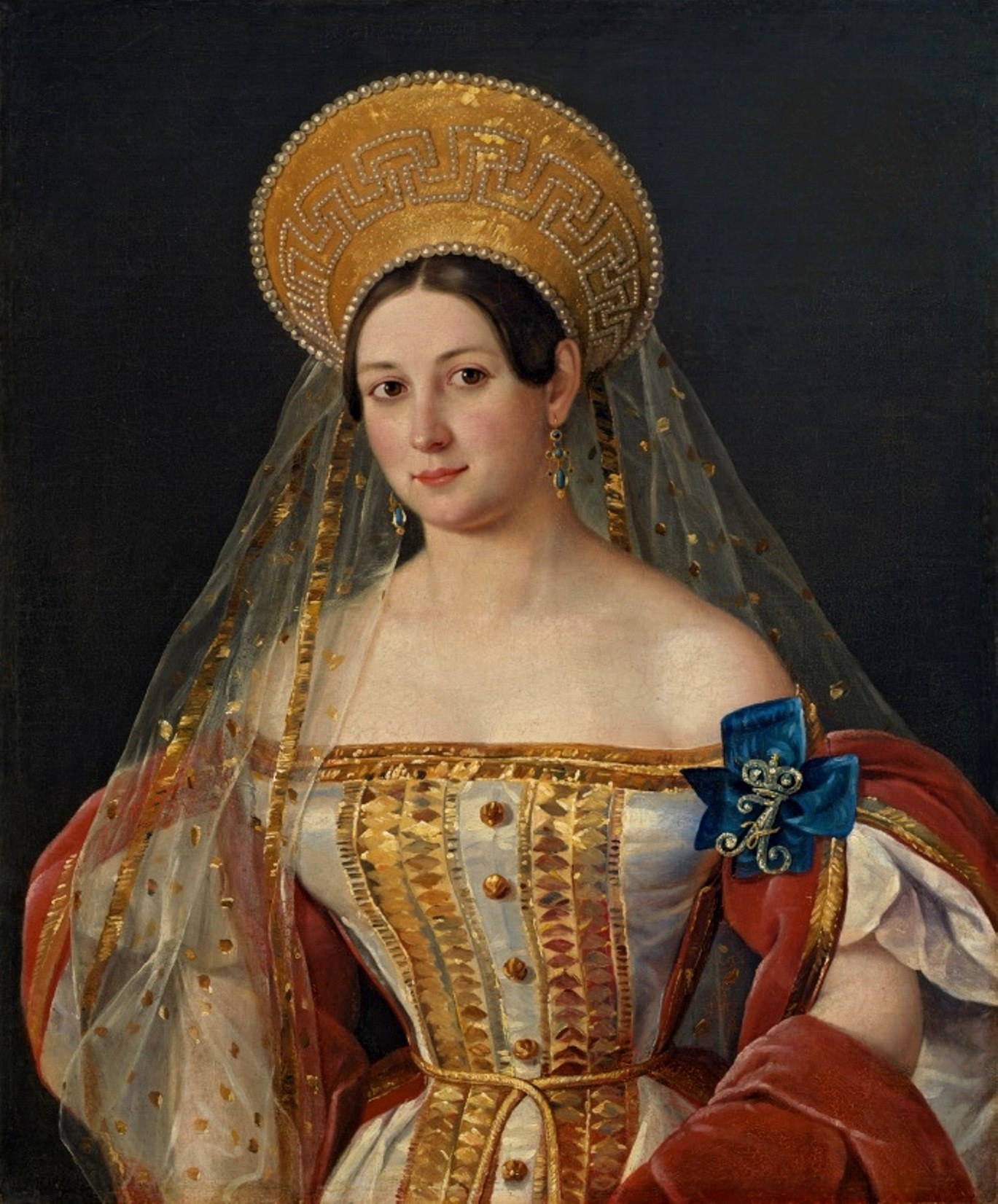 The deep, dark background isolates the figure, emphasizing her presence and the richness of her attire.