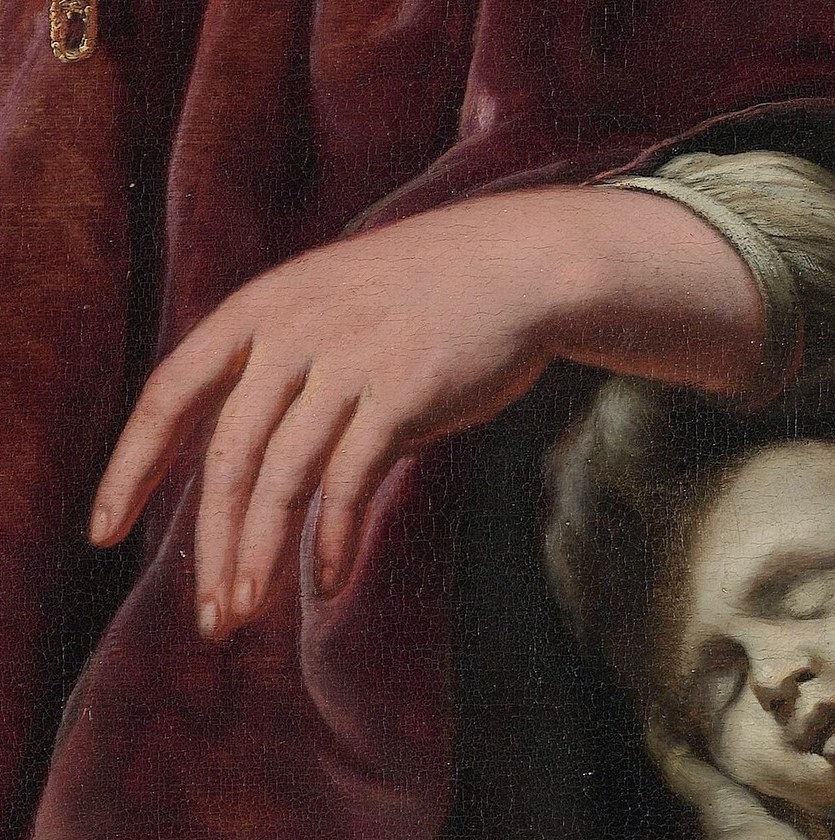 His left hand rests on a sculpture of Cupid.