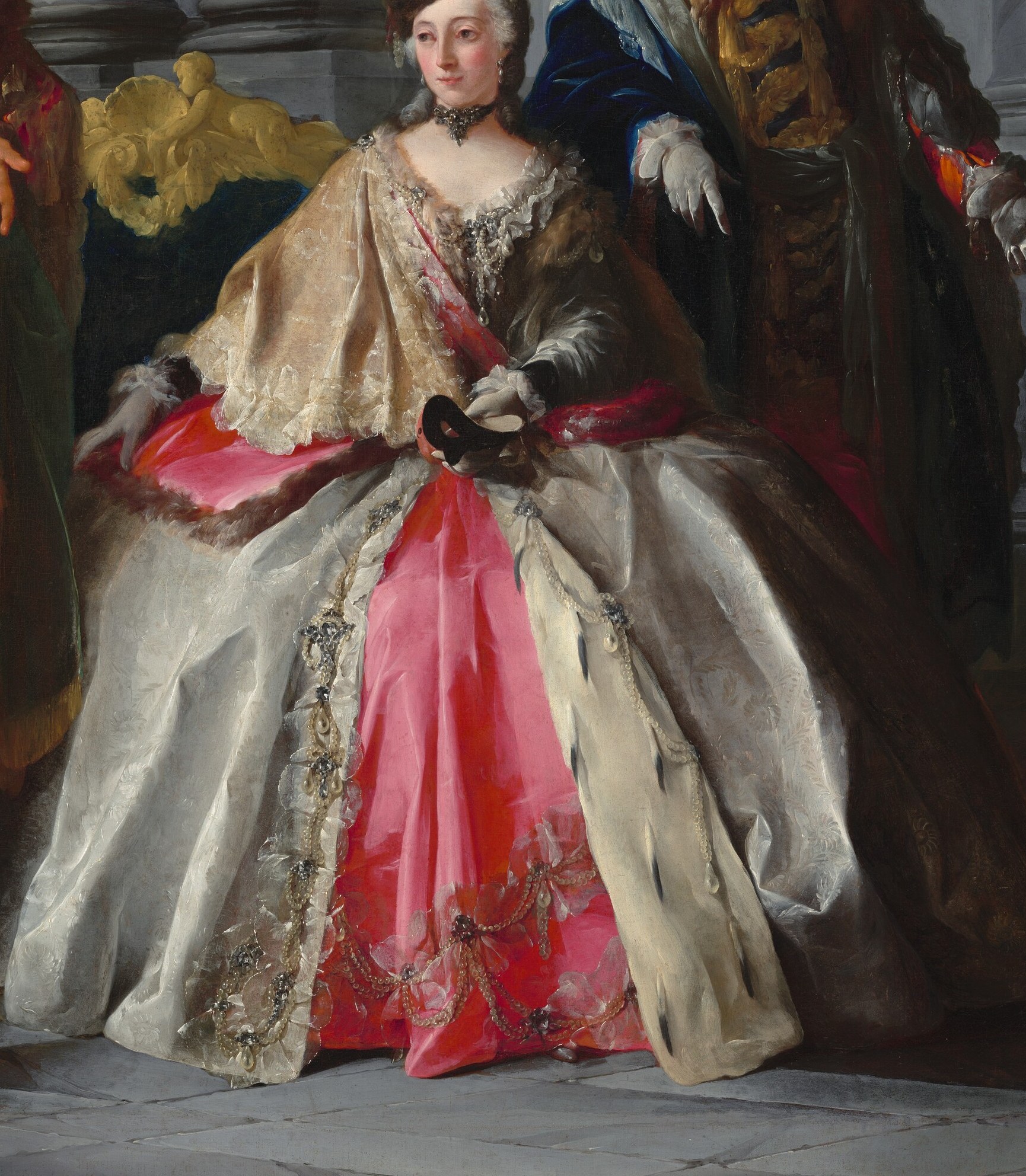 Her elaborate gown and the other costumes are also disguises.