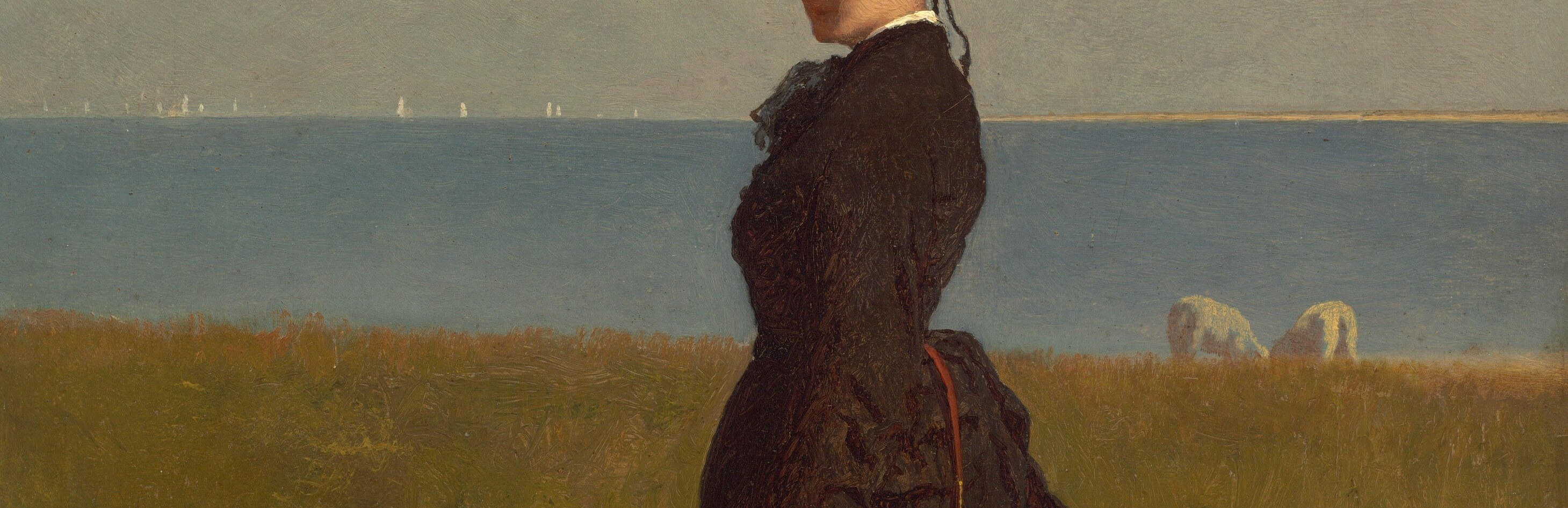 The distant ocean hints at the island's maritime history.