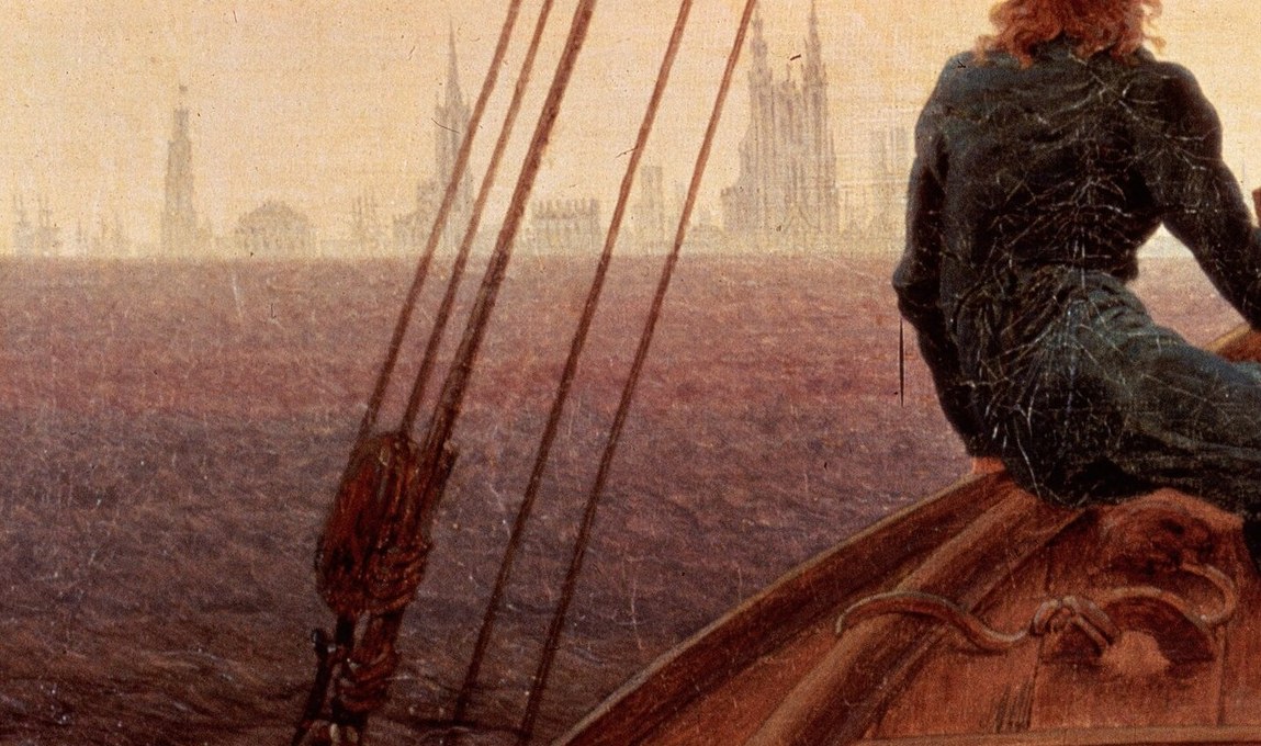 She gazes quietly towards a distant horizon.