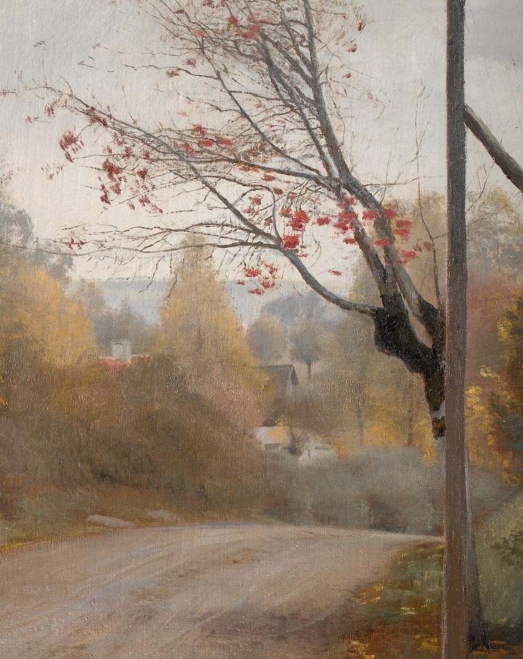 Its bare branches and sparse red berries evoke a sense of late autumn and perhaps isolation.
