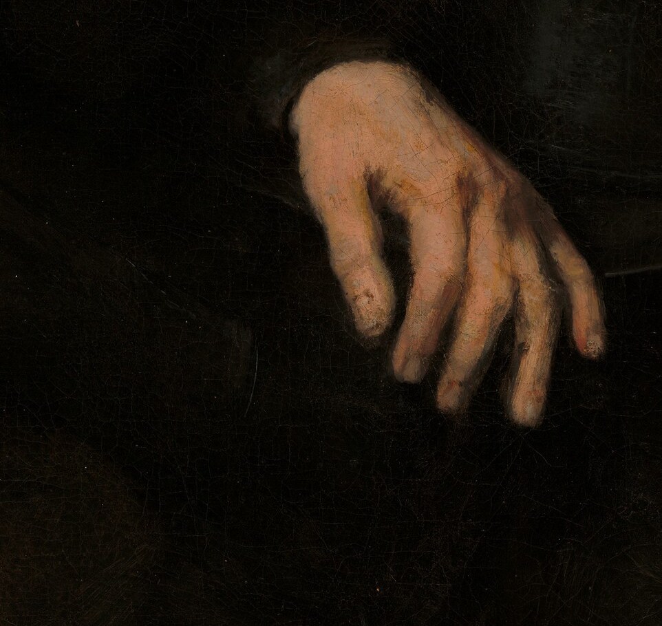 And the contemplative stillness of his hand.