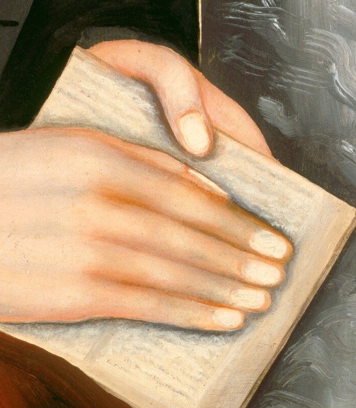 He holds a book, signaling his intellectual pursuits.