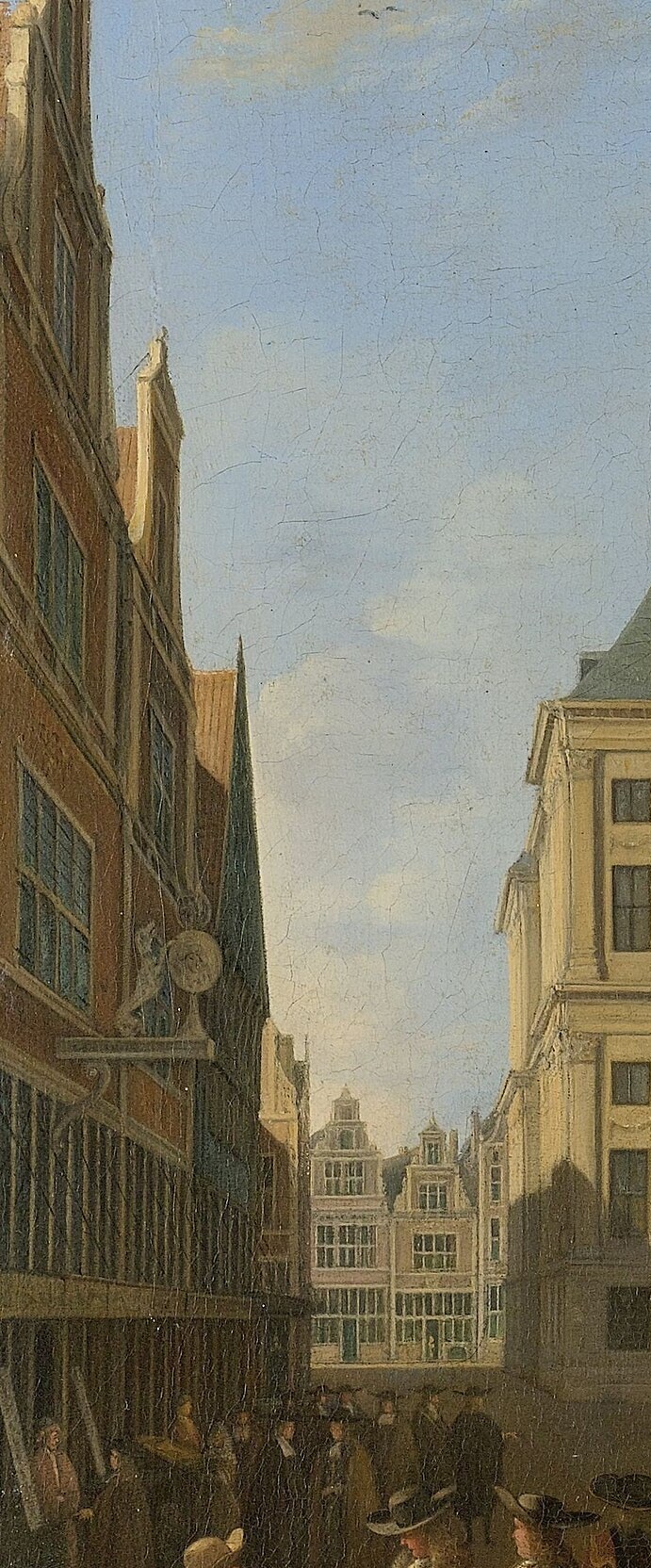 Look closely at the building facade on the left.