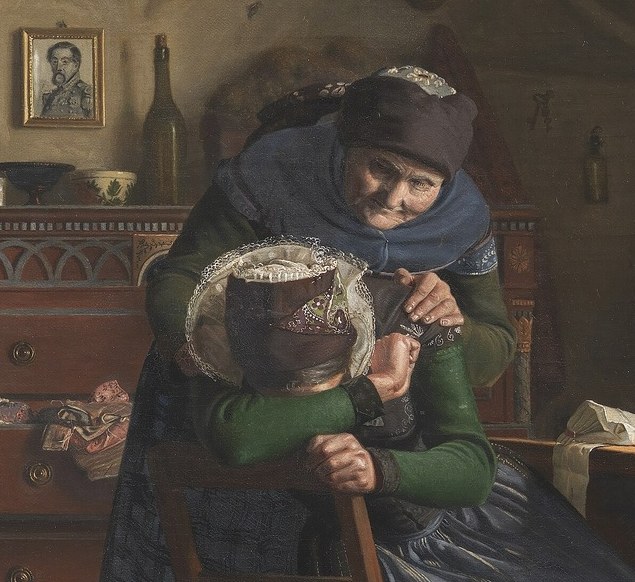 Her gesture of placing a hand on the grieving woman's head shows empathy and shared grief.