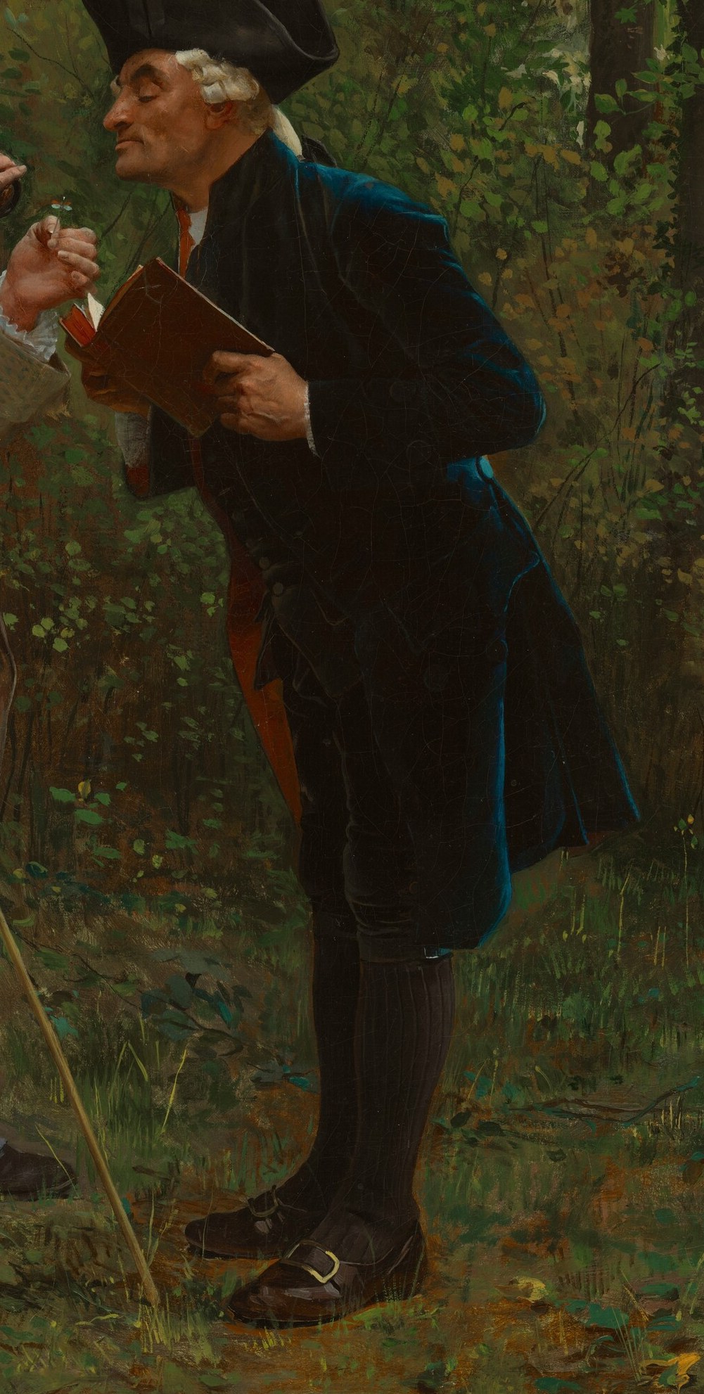 The other, engrossed in his book.