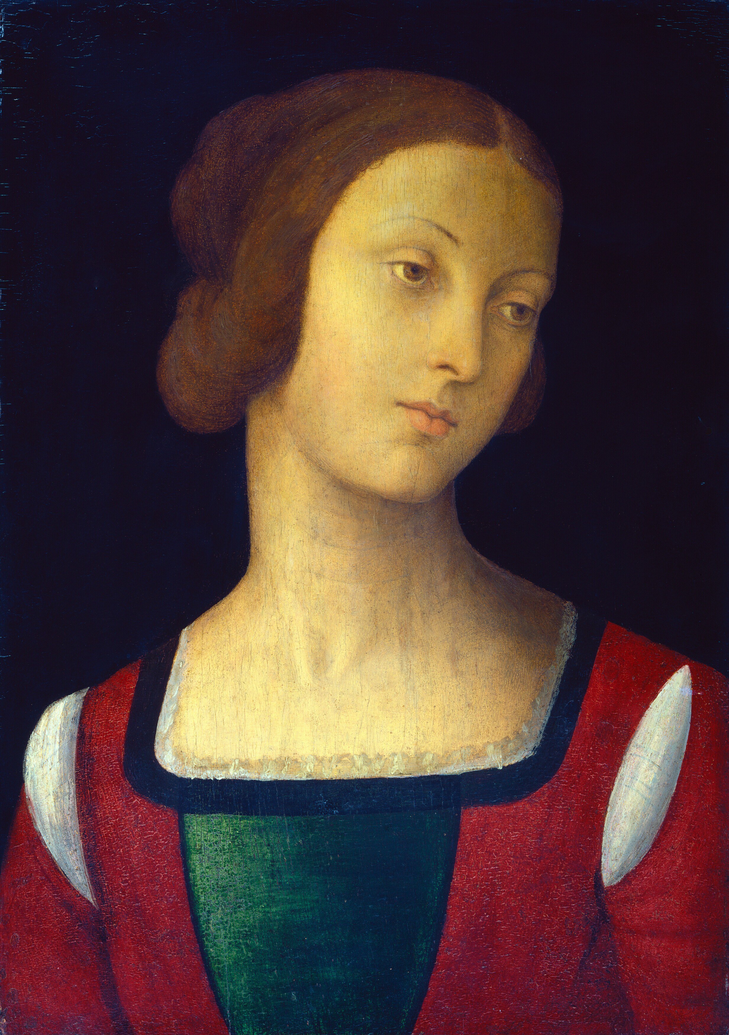 The dark background isolates the figure, intensifying her presence and the effect of chiaroscuro.
