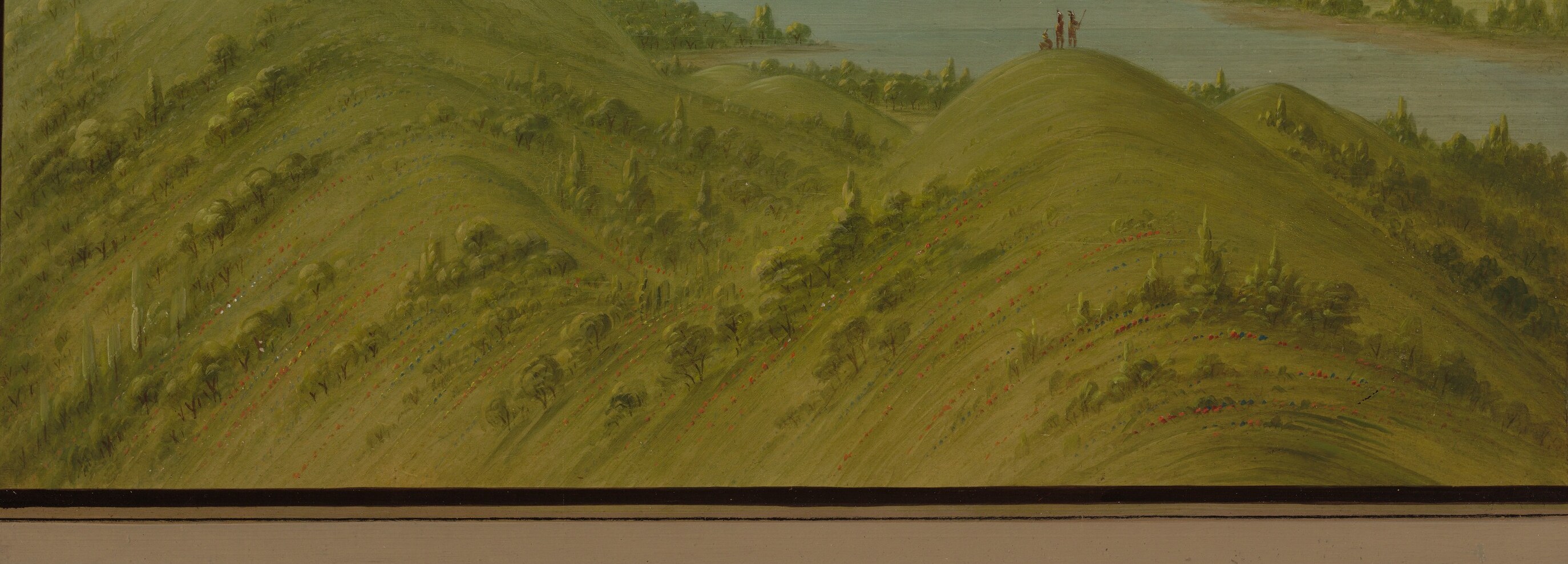 Indicates vegetation and adds texture to the rolling hills.