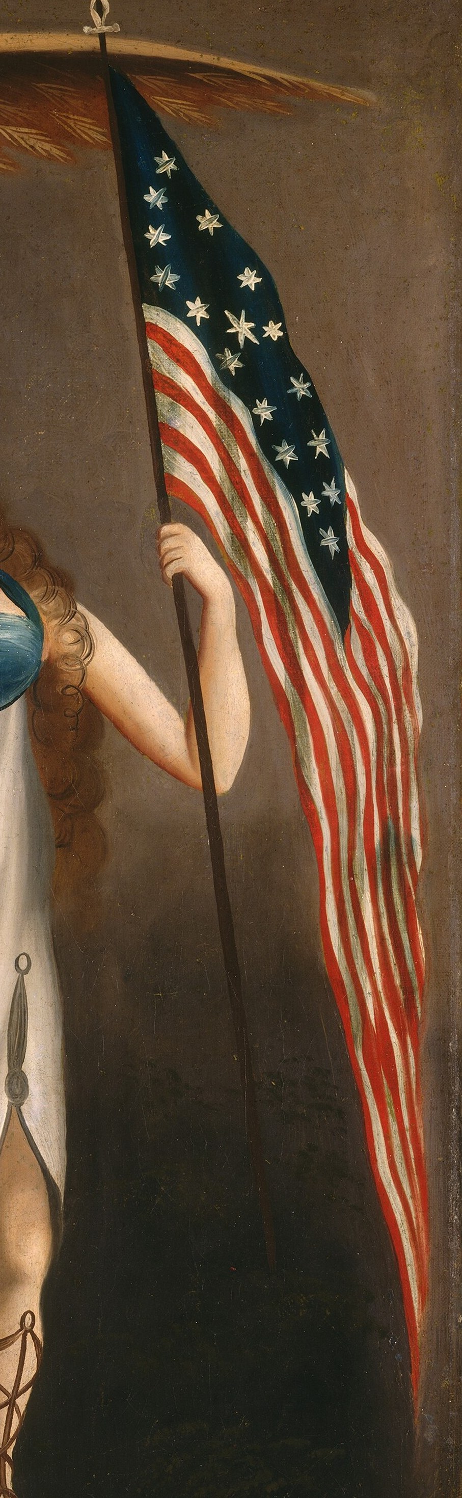 The flag is a clear symbol of the United States, its stars indicating a specific historical period.