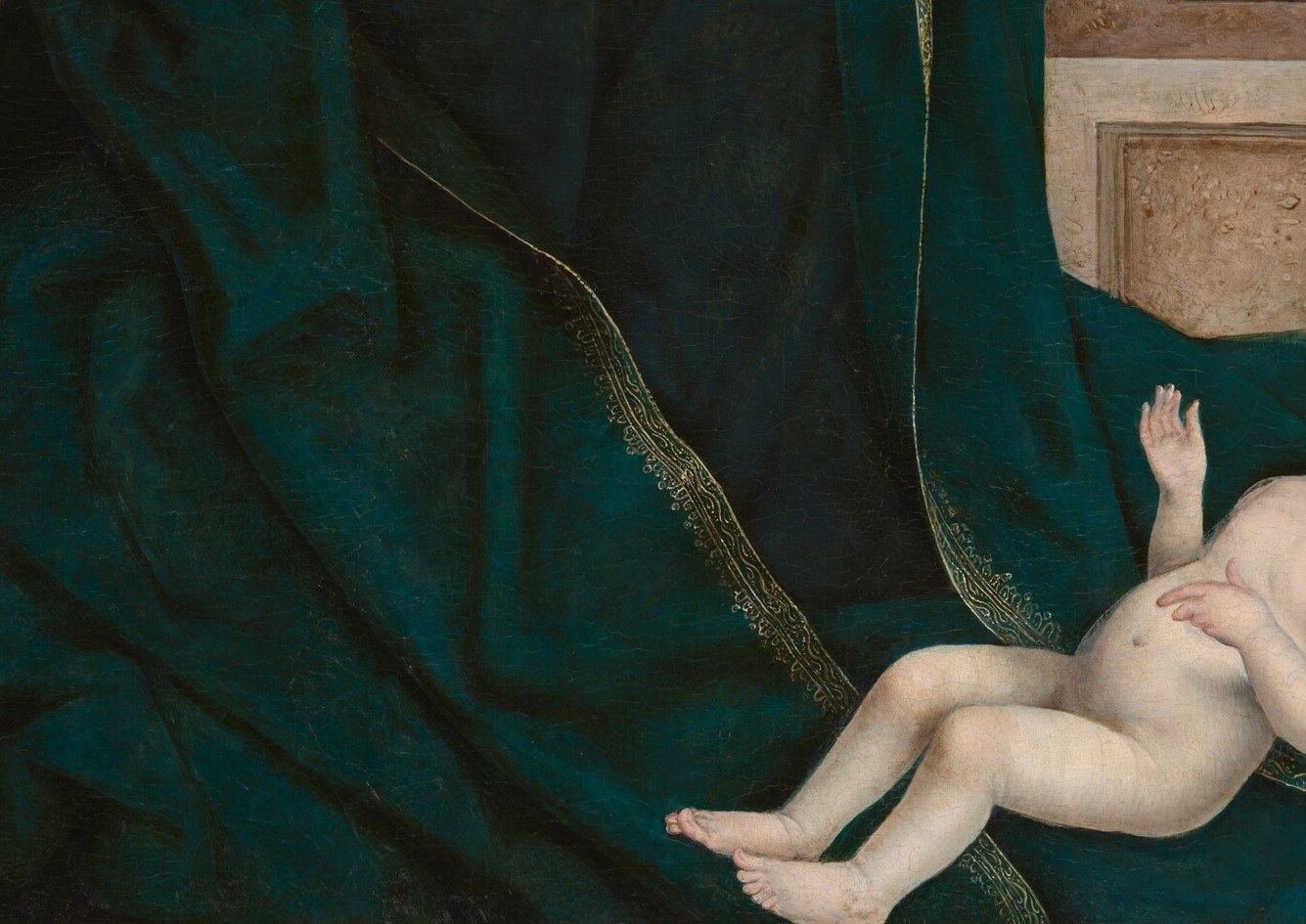 Look closely: the only light in the room comes from the infant.