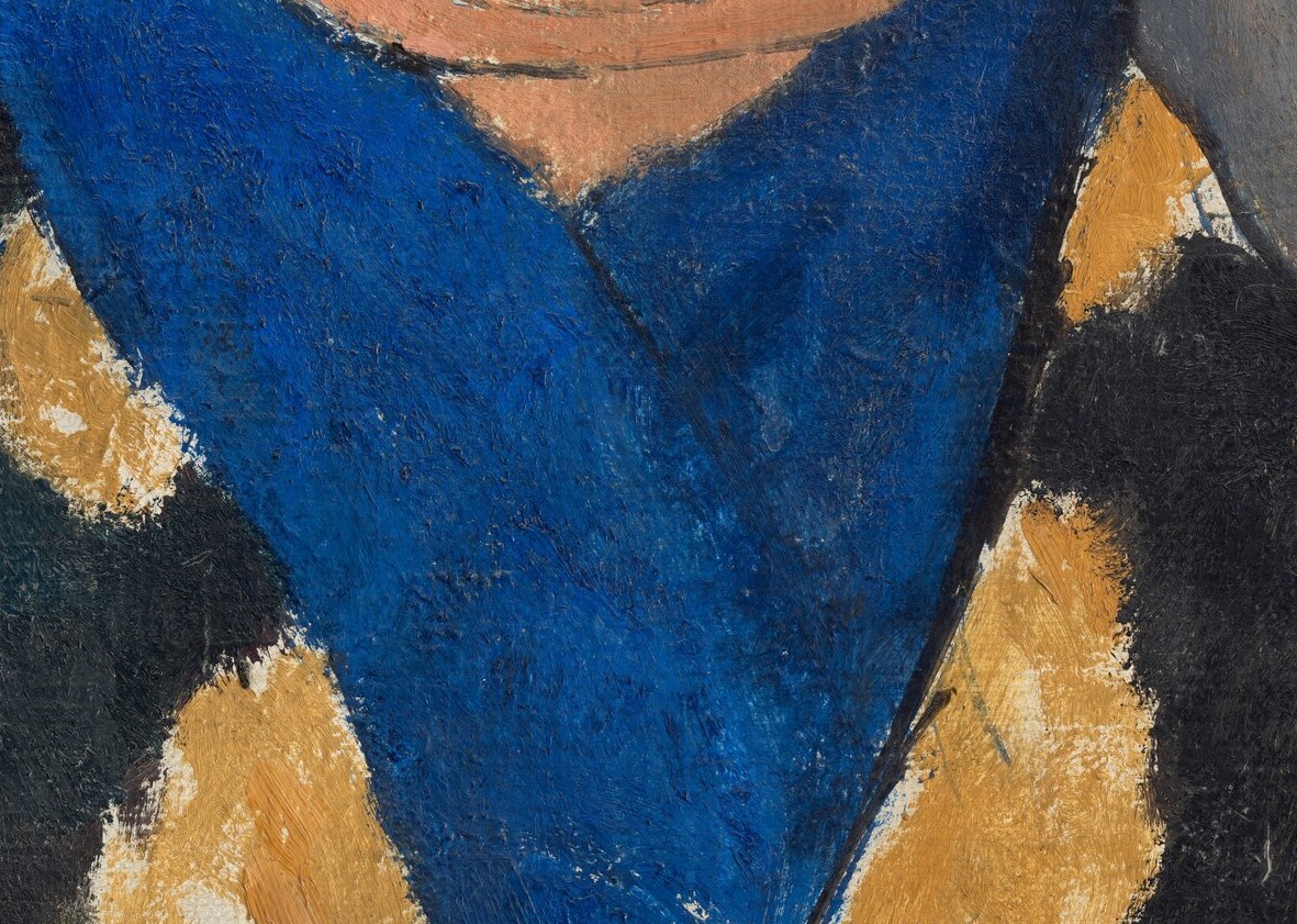 His vibrant blue cravat also feels like a costume.