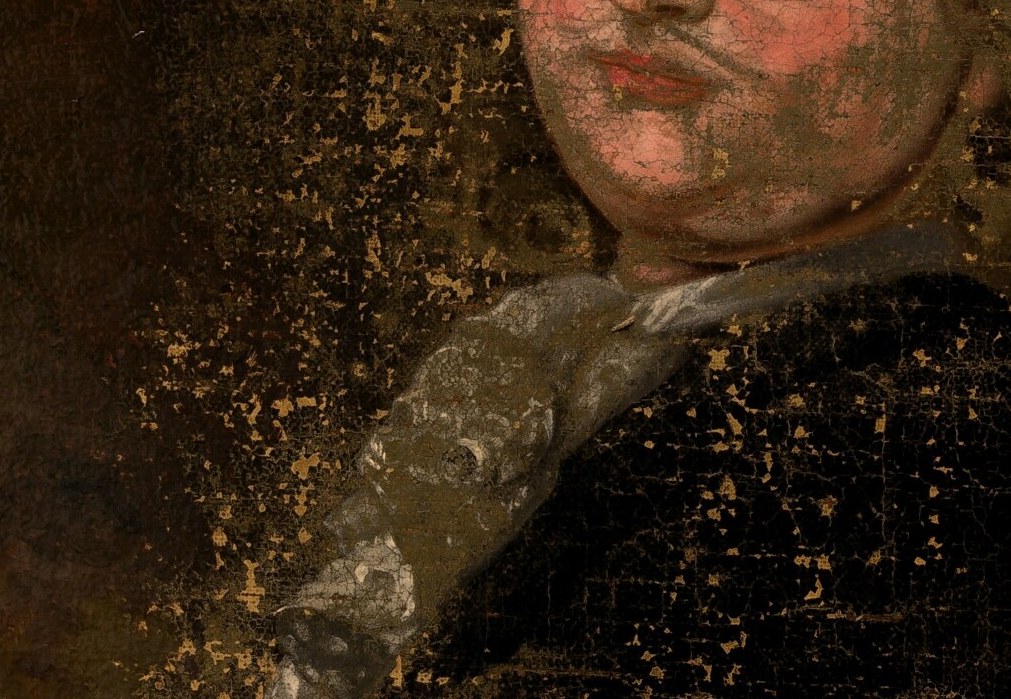 His composed mouth and strong jaw convey authority and control.