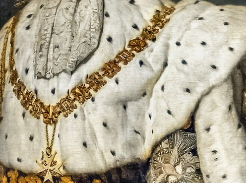 This prominent piece of regalia, with its Maltese cross pendant, signifies his high rank and membership in a prestigious chivalric order.