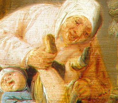 The infant is the focus of the diaper change, a vulnerable subject.